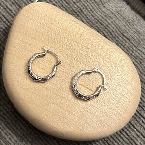 Fred Meyer Jewelers 14k white gold small faceted 7 sided hoop earrings